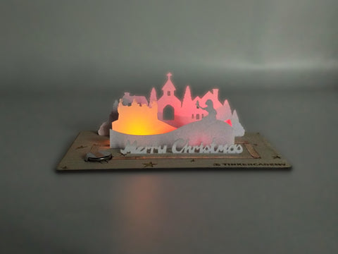 Tinkercademy's Evergreeting Diorama Kit Christmas Greeting Card lighted; Paper craft with Chibitronic LEDs and copper tape.